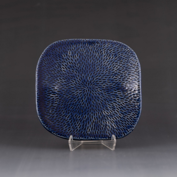 Carved blue tray by Camille Manzano