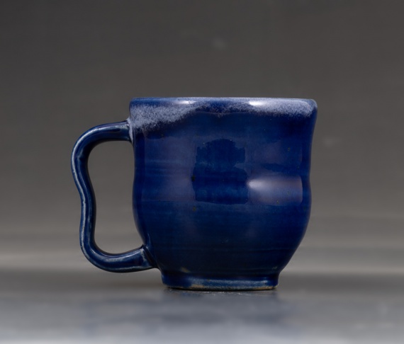 Blue cup with handle by Louis Mitchell