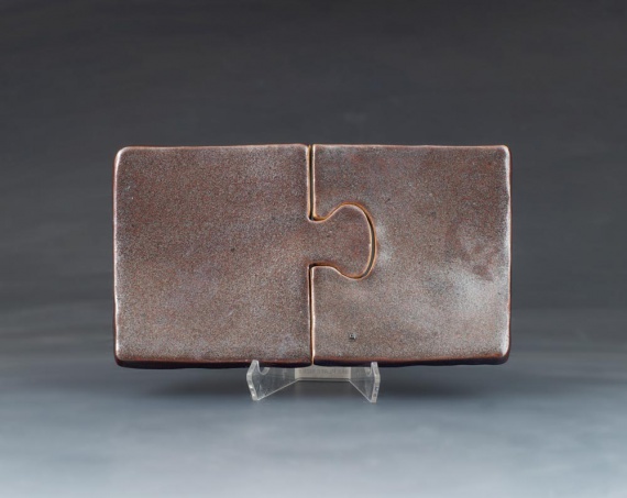 Puzzle piece tray by Mia Geoffray