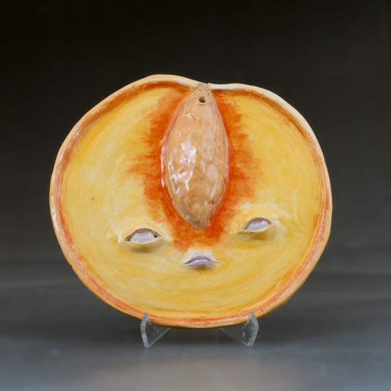Peach face plate by Syndey Wright