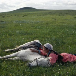 <p><b>Eve Arnold</b>, <i>CHINA. Inner Mongolia. Horse training for the militia</i>, 1979, © Eve Arnold/Magnum Photos</p>