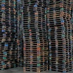 <p><b>Chris Jordan</b>, <i>Pallets #2, Seattle</i>, 2003. 44"x60". From 'Intolerable Beauty: Portraits of American Mass Consumption'.</p>