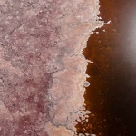 <p><b>Colin Finlay</b>, <i>The shore of Lake Magadi. [The birds] only lay eggs every 6 years and are extremely sensitive to water quality.</i> From his 'Industrial Aerials' series.</p>