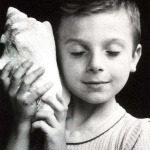 <p><b>Édouard Boubat</b>, <i>Remi Listening To The Sea</i>, 1995.</p>