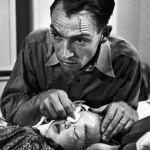 <p><b>W. Eugene Smith</b>, <i>Dr. Ceriani with Lee Marie Wheatly, a two-and-a-half-year-old child who needed emergency treatment after having been kicked in the head by a horse. Colorado, USA. 1948.</i></p>