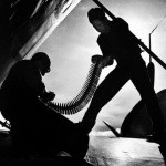 <p><b>W. Eugene Smith</b>, <i>Ammunition being loaded onto planes aboard the USS Bunker Hill aircraft carrier. World War II. The Pacific Campaign. 1943.</i></p>