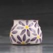 White vase with purple flower pattern by Annie Taylor