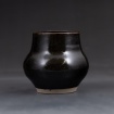 Black vase by Jadon Schatz