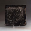 White on black tray by Meghan Duft, fired to cone 04